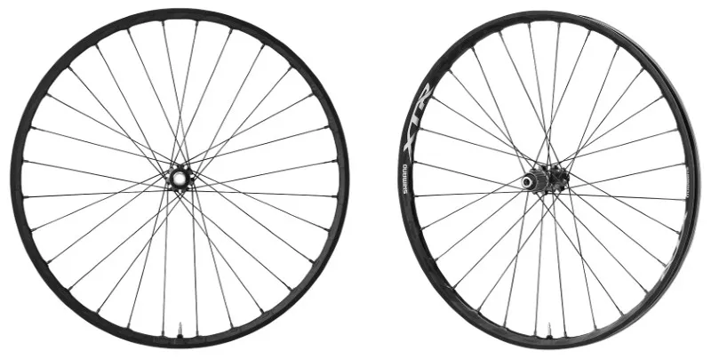 ROTI SHIMANO XTR WH-M9000-TL-F15/R12-29 FATA & SPATE 28H/28H JANTA CLINCHER (TUBELESS COMPA TIBLE) FATA 15MM SPATE 12MM E-THRU PT. ROTOR CENTER LOCK (CU PIULITA DE STRANGERE) AMBALAT IND. Chilipir