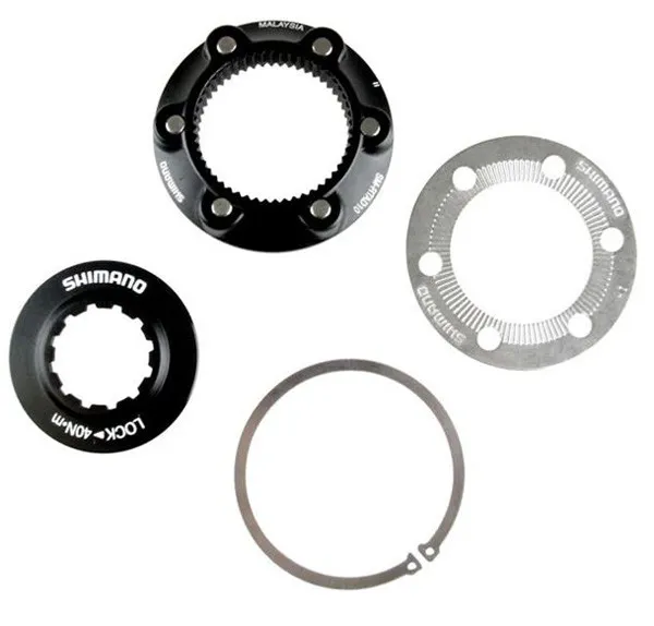 ADAPTOR SHIMANO DE LA BUTUC CENTER LOCK LA ROTOR 6-SURUBURI SM-RTAD10 AMBALAT IND. Preț promoțional